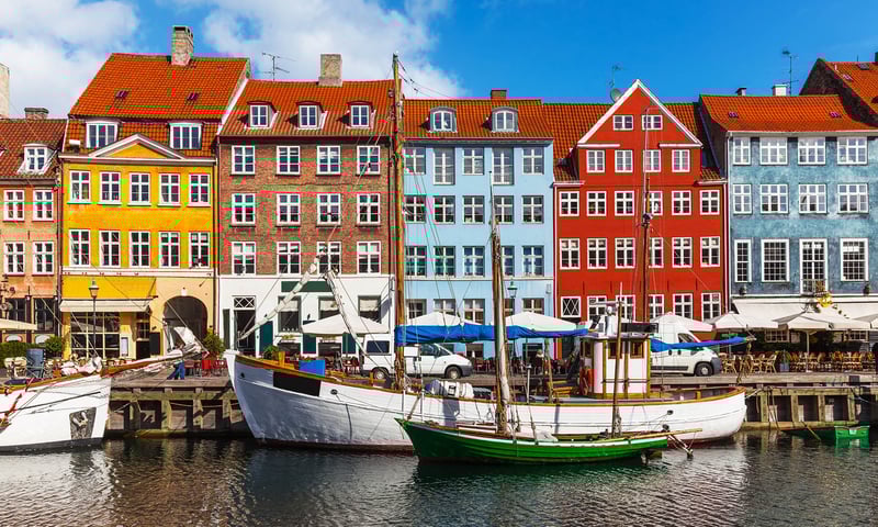 Explore historic Nyhavn Port at your own pace in Copenhagen, Denmark.