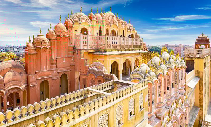 Discover ornate palaces like the Hawa Mahal in Jaipur, India.