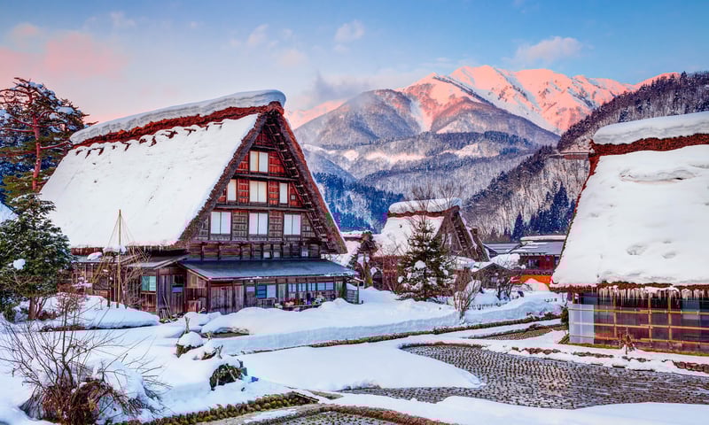 Snow transforms  traditional farmhouses into fairytale-like homes at Shirakawa-go, Japan.