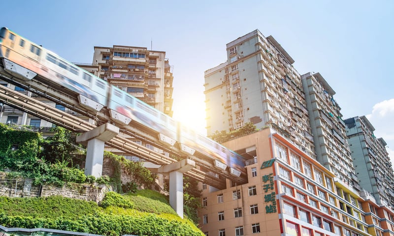 Liziba Station is China's first monorail station built through a block of flats.