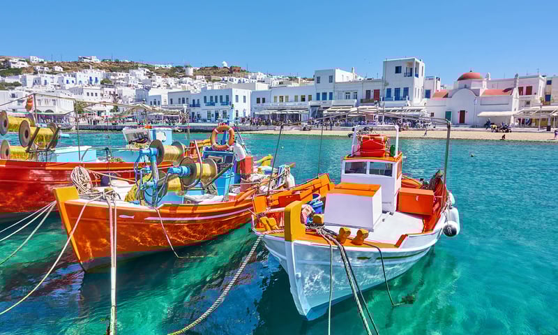 Discover sun-soaked beaches of Mykonos, Greece.