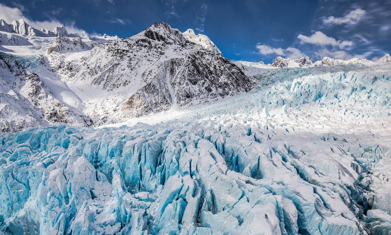 Franz Josef glacier, sitting in the incredible Westland Tai Poutini National Park, is a UNESCO site.