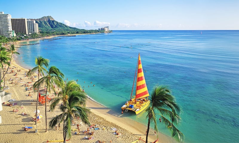 Feel the sands of Waikiki Beach between your toes during your leisure time in Hawaii.
