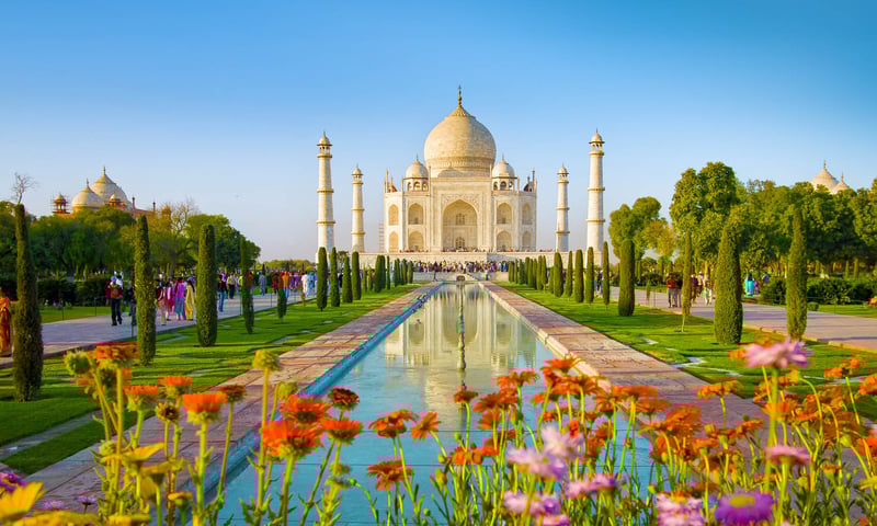 See the imposing Taj Mahal in Agra.
