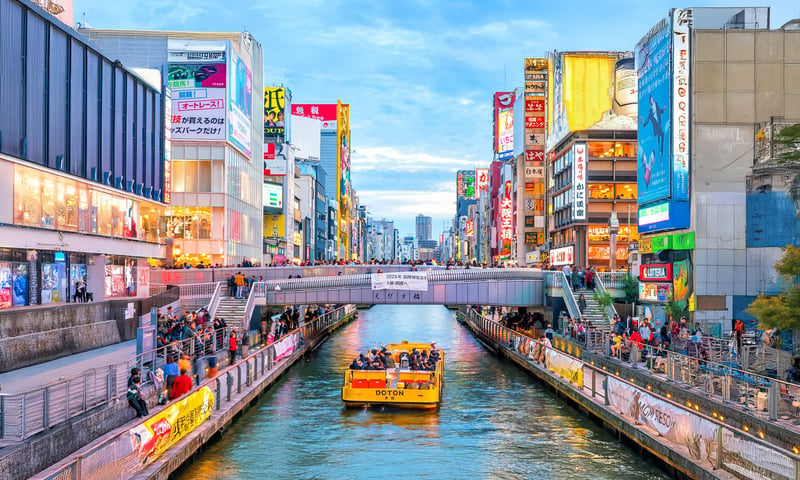 Experience the bright lights of Osaka's Dotonbori.