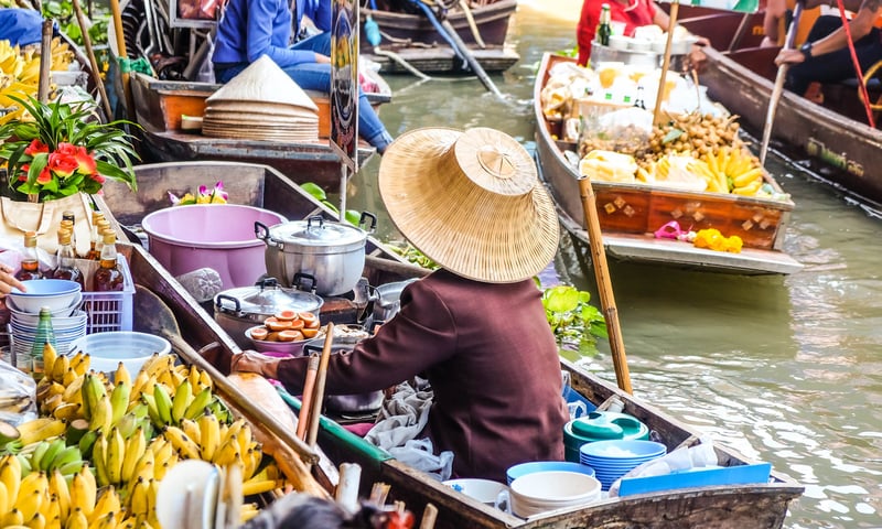 Visit the Damnoen Floating Markets during leisure time in Bangkok, Thailand (charges apply).
