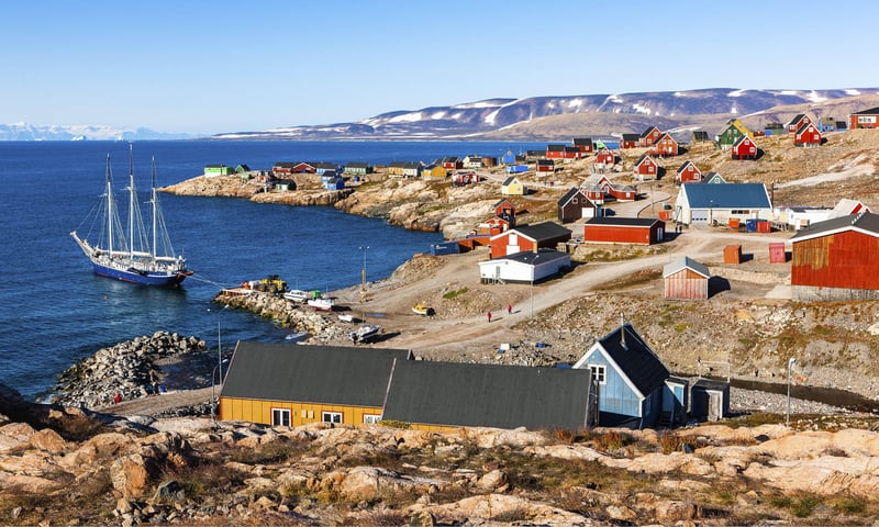 Cruise to Greenland, stopping at one of the world’s most remote towns, Ittoqqortoormiit.