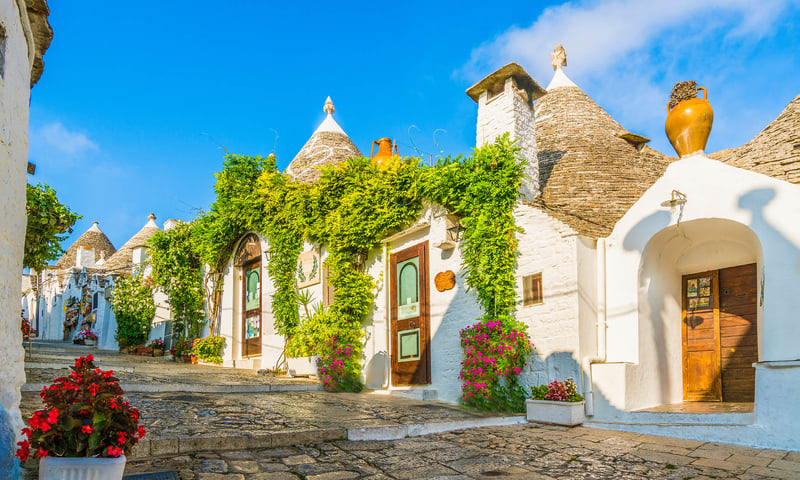 See the historic houses in Alberobello, Italy.