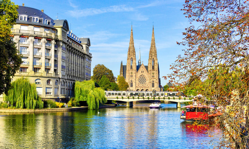 Explore Strasbourg's picturesque old town overlooking canals.