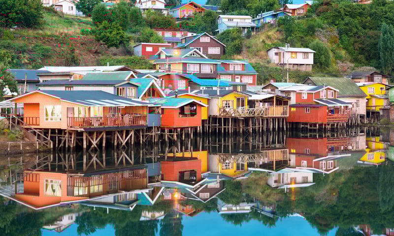 Look out for traditional stilt houses in Castro, Chile (Itinerary 2).