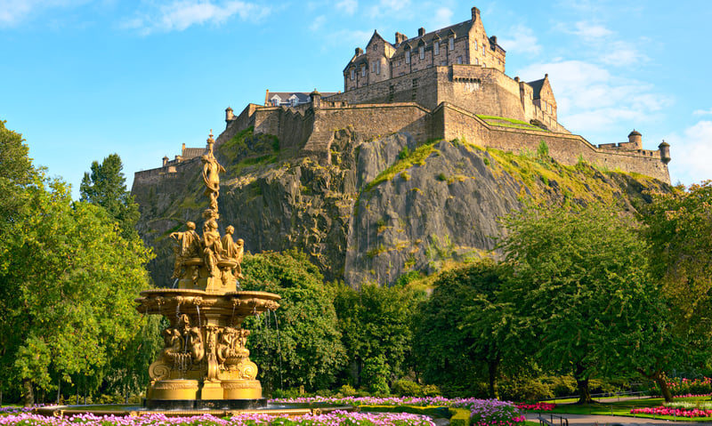 See Edinburgh Castle atop Castle Rock in Edinburgh, England.
