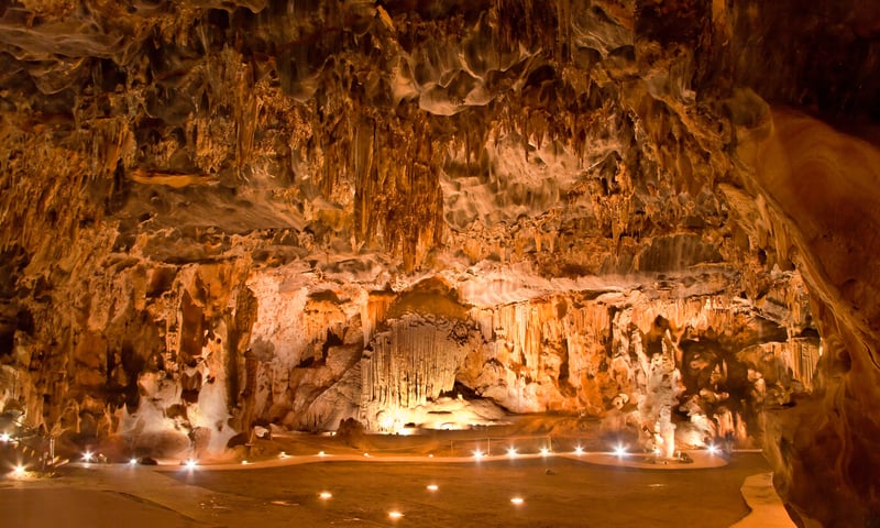 Take a guided tour of Cango Caves in Oudtshoorn, South Africa.