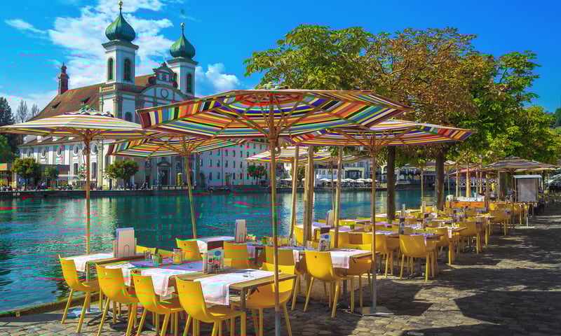 Delight in the street cafes on Reuss River in Lucerne, Switzerland.