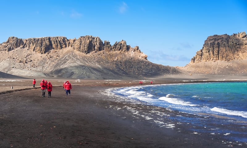 Step foot on the shores of Deception Island, Antarctica (subject to weather conditions).