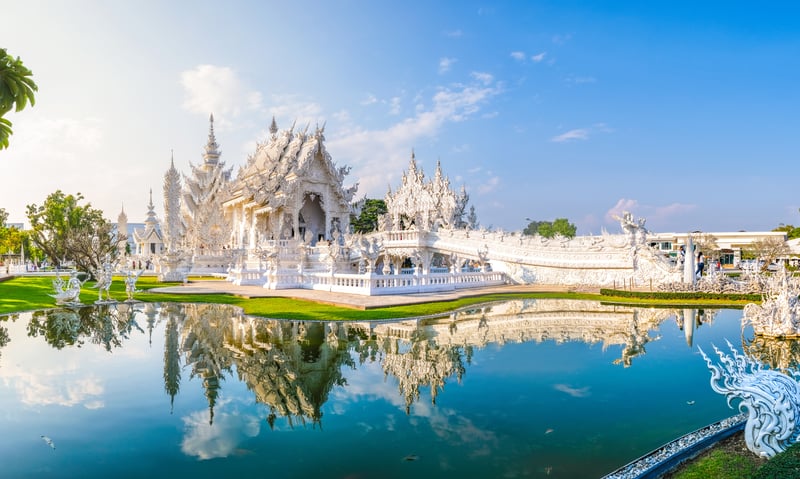 Admire the details of the White Temple (Wat Rong Khun) in Chiang Rai, Thailand.