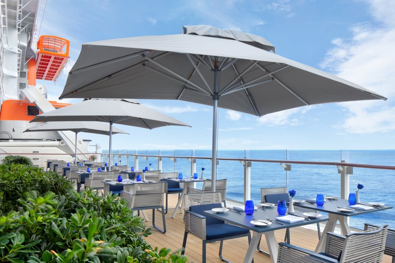 Enjoy a meal by the sea aboard the Celebrity Ascent.