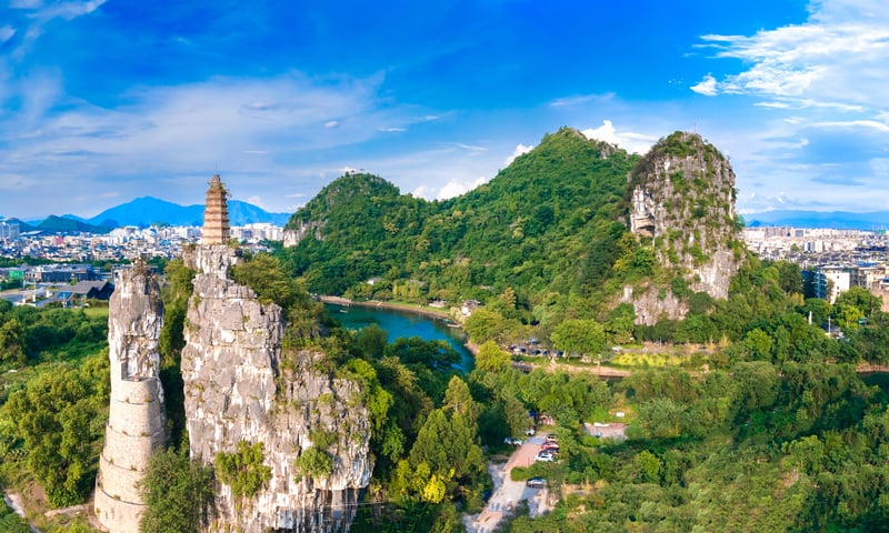 Find waterfalls, caves and pagodas in Chuansan Park, Guilin.