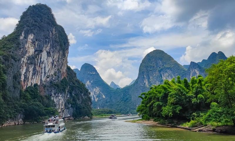 Unwind with a scenic Li River Cruise (Optional activity).