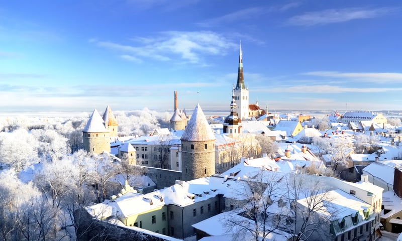 Admire the snow-capped skyline of Tallinn, Estonia.