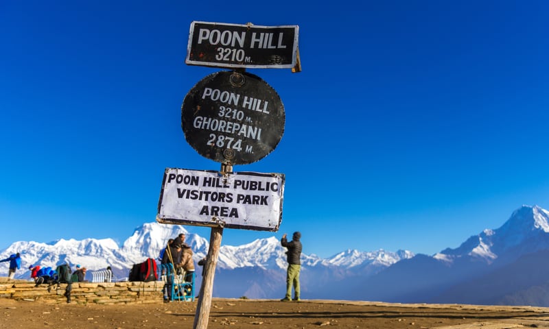 Witness a spectacular sunrise over the mountains from Poon Hill, Nepal.
