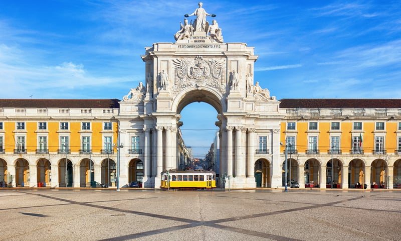 See iconic Commerce Square and Rua Augusta Arch in Lisbon.