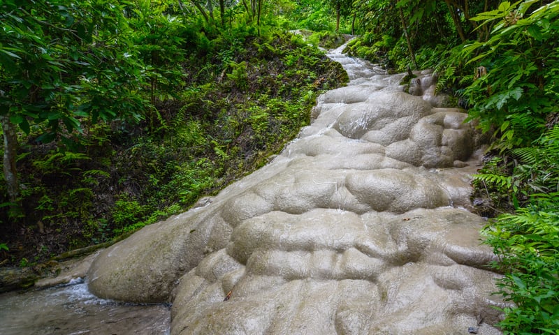 See the unique landscapes of Bua Tong Waterfall in Mae Ho Phra, Thailand.