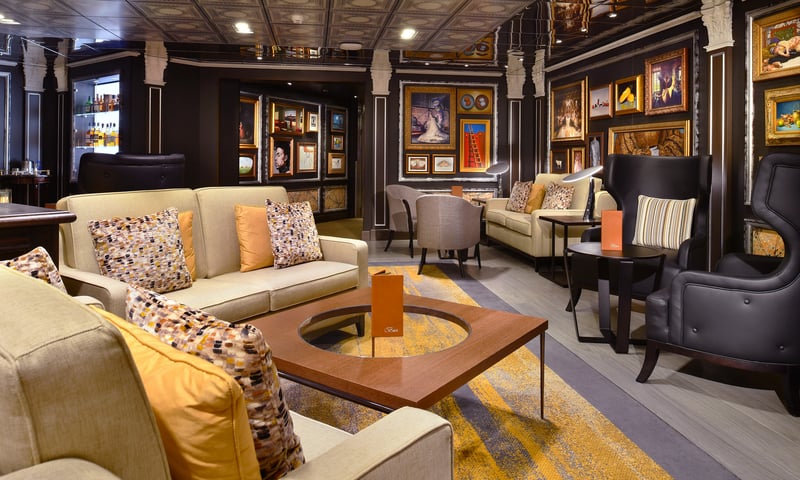 Unwind in the Gallery Bar aboard Holland America's Westerdam.