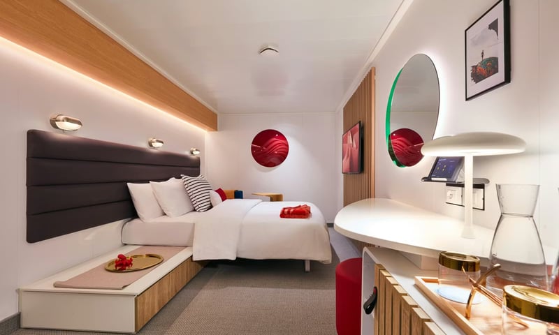 Stay in the Insider Cabin aboard the Scarlet Lady.