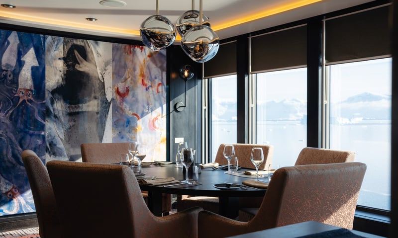 Dine at Lindstrom restaurant aboard MS Roald Amundsen (charges may apply).