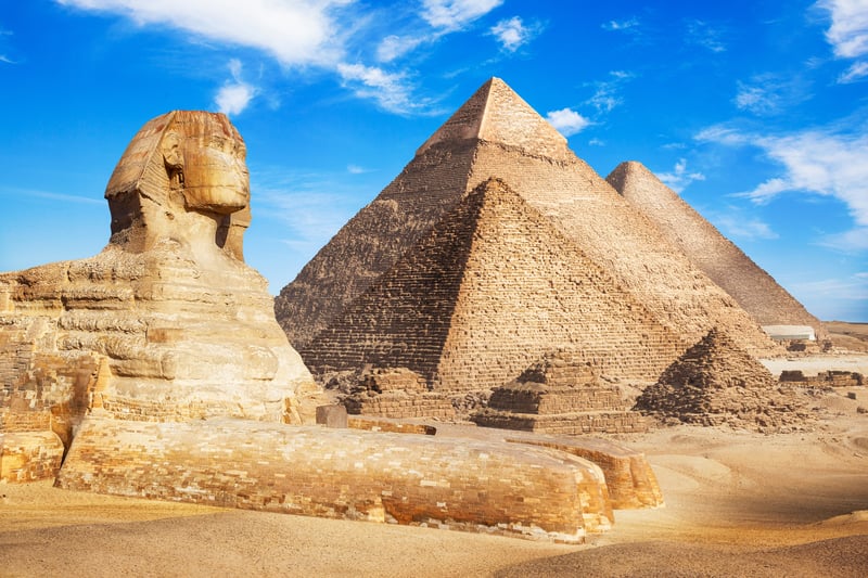 Visit the Sphinx and Pyramids of Giza in Cairo, Egypt.