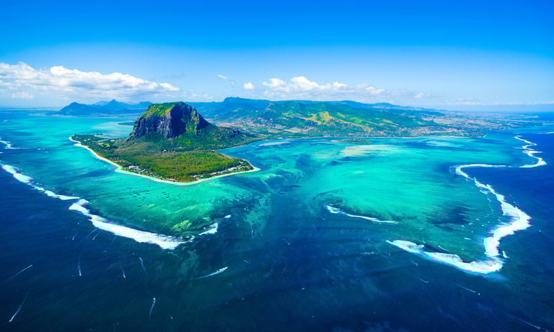 Aerial view of Le Morne Brabant peninsula and underwater waterfall in Mauritius (Itinerary 2).