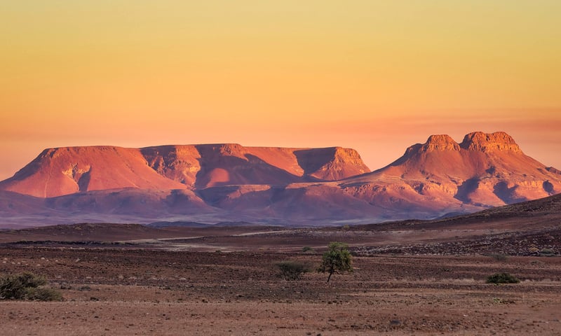 Enjoy a picnic lunch in the shadow of Namibia's Brandberg Mountain.
