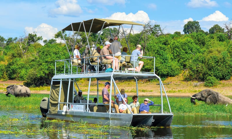 Board a private boat to your safari lodge in Namibia.