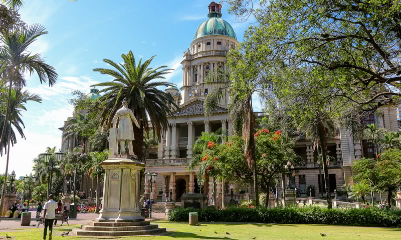 Discover the vibrant waterfront and historic architecture of Durban, South Africa.