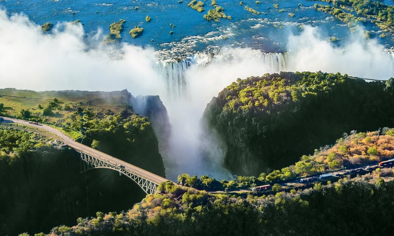 Catch your first glimpse of “The Smoke That Thunders”, Victoria Falls.