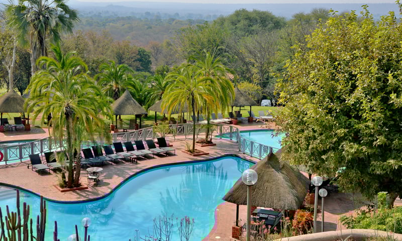 Lounge by the pool at Elephant Hills Resort in Victoria Falls, Zimbabwe.