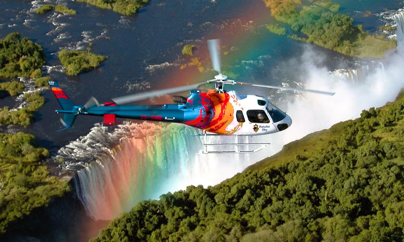 Take an optional helicopter ride over Victoria Falls, Zimbabwe (charges apply).
