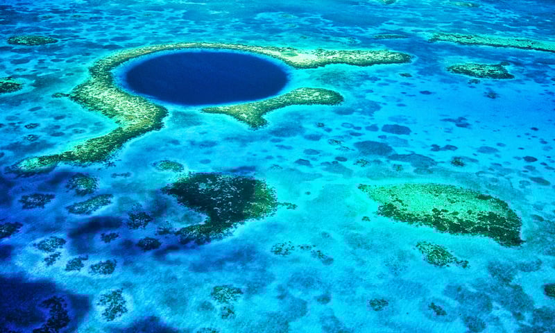 Discover the blue holes of Belize Barrier Reef during your leisure time, Itinerary 2 & 3 only.