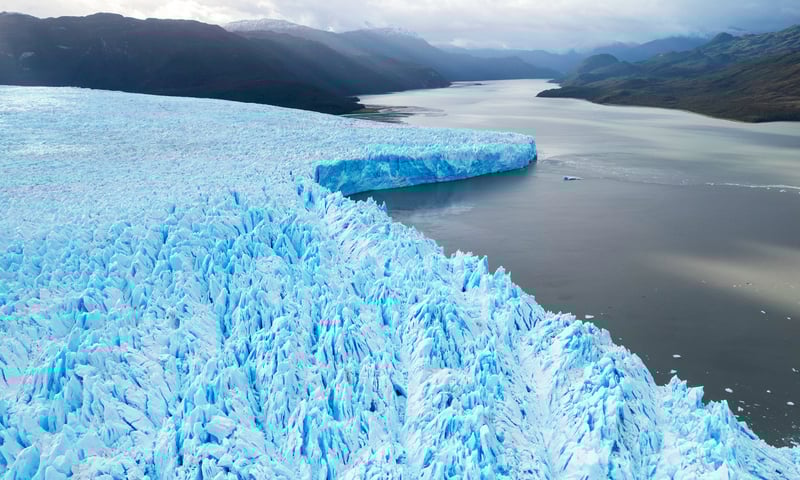 Cruise past Pío XI Glacier, also known as Brüggen Glacier, a natural wonder in Chilean Patagonia.