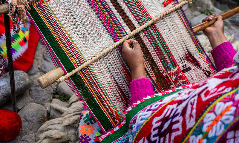 See how the local artisans weave the colourful Peruvian garments.