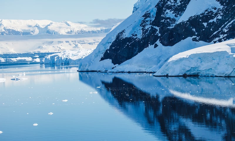 Cross the Drake Passage between South America and Antarctica.