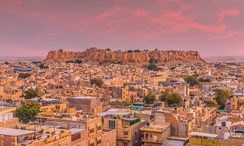 Marvel at the World Heritage Listed Golden Fort and surrounding city of Jaisalmer, India.