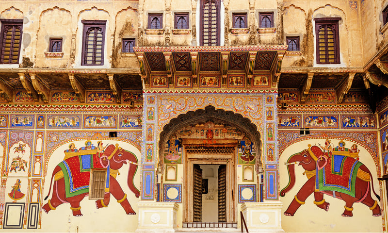 Stroll among traditional Mandawa's frescoed havelis and merchant palaces, India.