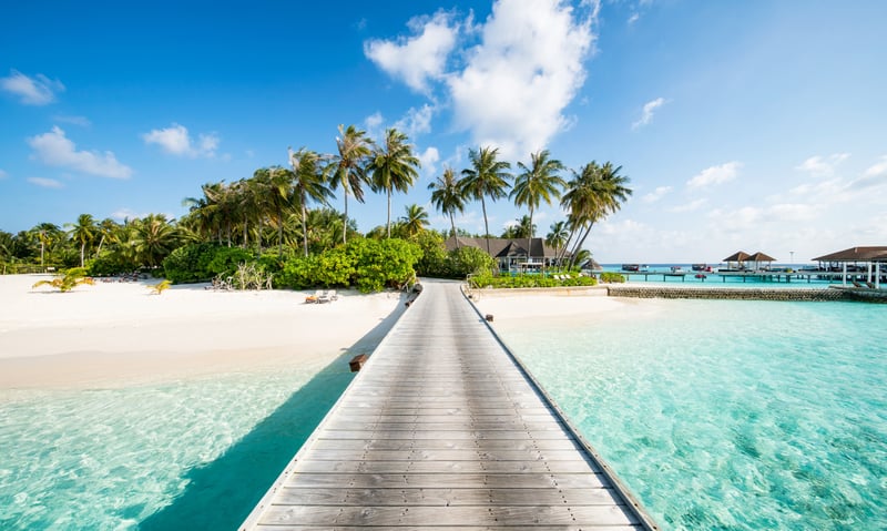 Marvel at the turquoise waters in the Maldives.