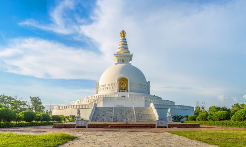 Visit the iconic World Peace Pagoda in Lumbini, Nepal.