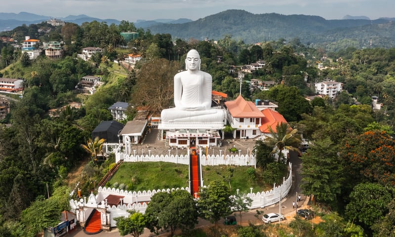 The Sri Maha Boddhi Viharaya Buddist Temple watched over the city of Kandy, Sri Lanka.