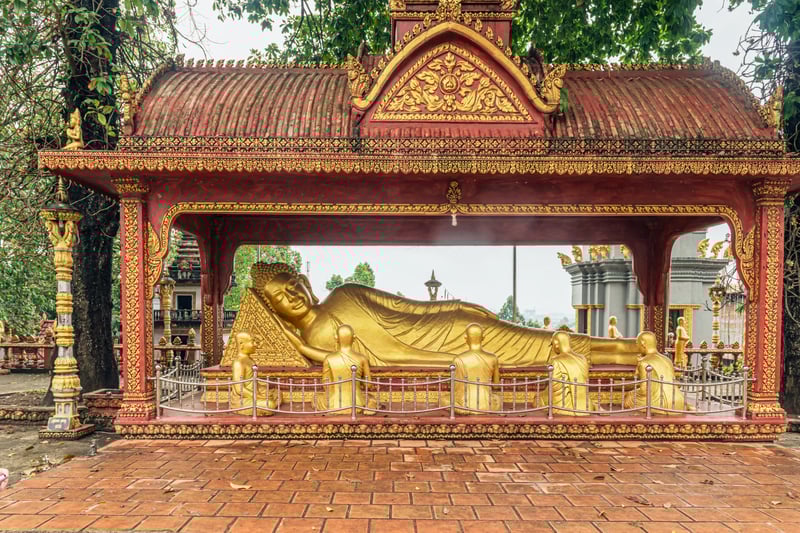 Remove your shoes as a sign of respect before entering Wat Krom temple in Sihanoukville.