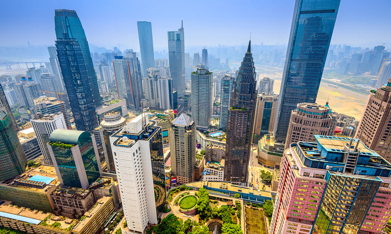 Visit Chongqing, in the confluence of the Yangtze and Jialing rivers in southwestern China.