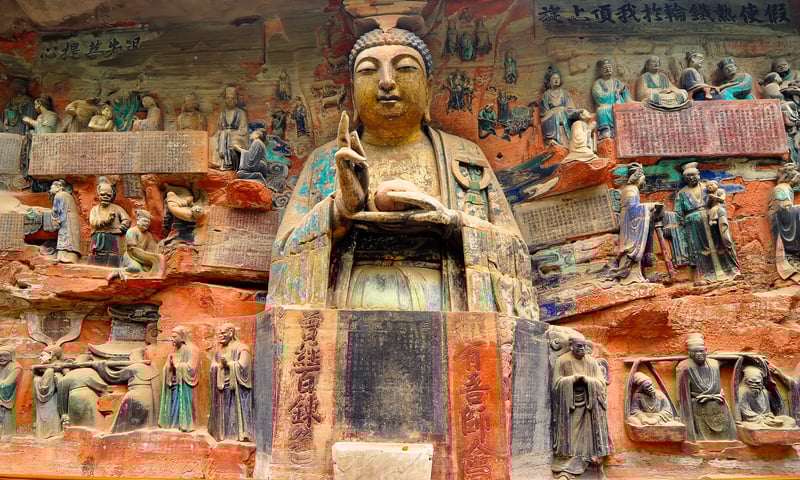 Marvel at the intricate rock carvings at Dazu. (Optional activity, additional charges apply)
