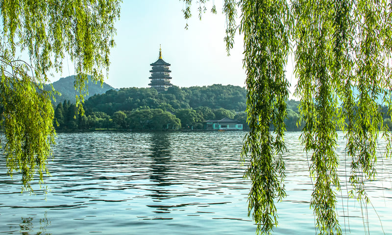 Enjoy a scenic boat ride on the UNESCO-listed West Lake in Hangzhou, China.